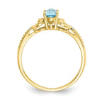10k 6x4mm Oval December/ Light Swiss Blue Topaz and Diamond Ring