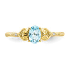 10k 6x4mm Oval December/ Light Swiss Blue Topaz and Diamond Ring