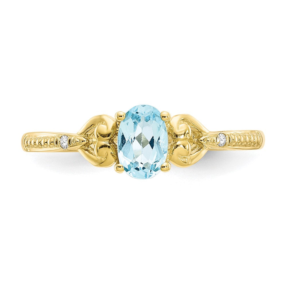 10k 6x4mm Oval December/ Light Swiss Blue Topaz and Diamond Ring