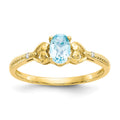 10k 6x4mm Oval December/ Light Swiss Blue Topaz and Diamond Ring