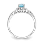 10k White Gold 6x4mm Oval December/ Swiss Blue Topaz and Diamond Ring