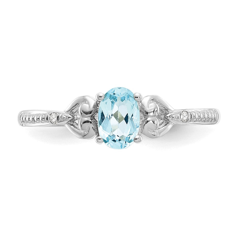 10k White Gold 6x4mm Oval December/ Swiss Blue Topaz and Diamond Ring