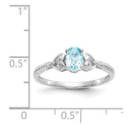10k White Gold 6x4mm Oval December/ Swiss Blue Topaz and Diamond Ring