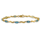 14k Complete Diamond and Oval Swiss Blue Topaz Wavy Link 7 inch Bracelet