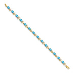 14k Complete Diamond and Oval Swiss Blue Topaz Floral 7 inch Bracelet