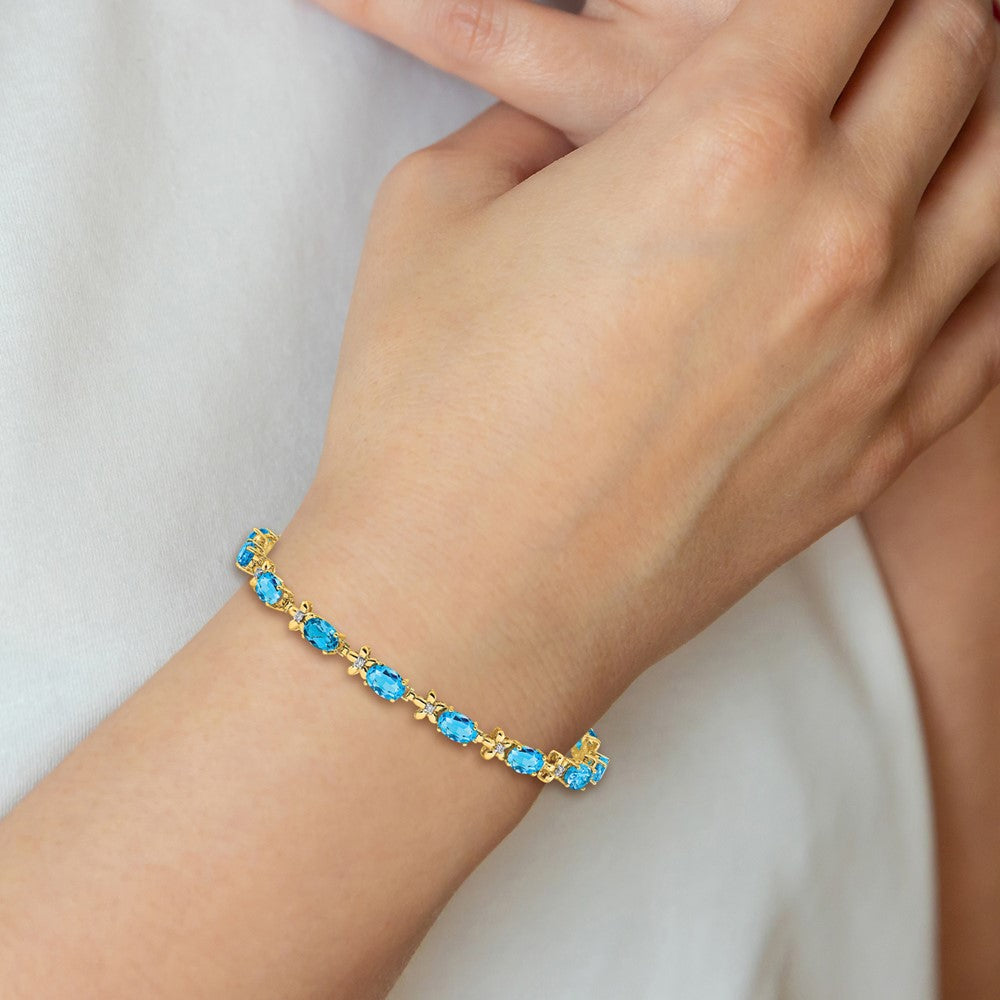 14k Complete Diamond and Oval Swiss Blue Topaz Floral 7 inch Bracelet