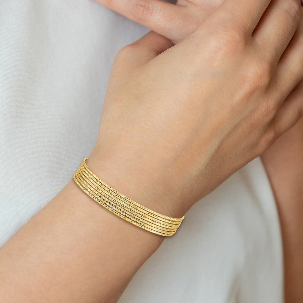 14K Polished and Textured with Dangle Heart 7-Strand 11.00mm Slip-on Round Bangle Bracelet
