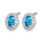 14k White Gold 5x3 Oval Blue Topaz Cabochon and .16 carat Diamond Halo Post Earrings