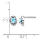 14k White Gold 5x3 Oval Blue Topaz Cabochon and .16 carat Diamond Halo Post Earrings