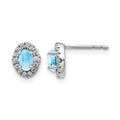 14k White Gold 5x3 Oval Blue Topaz Cabochon and .16 carat Diamond Halo Post Earrings