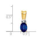 14k with White Rhodium Diamond and Oval Sapphire Pendant