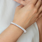 Sterling Shimmer Sterling Silver Rhodium-plated 15 Stone CZ Hinged Bangle Bracelet
