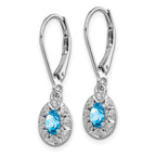 Sterling Silver Rhodium-plated Diam. & Blue Topaz Earrings