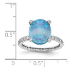 Cheryl M Sterling Silver Rhodium-plated Cabochon Lab Created Blue Opal and Brilliant-cut CZ Oval with Side Stones Ring
