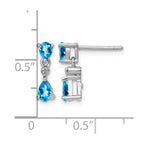 Sterling Silver Rhodium-plated Blue Topaz and Diamond Post Earrings