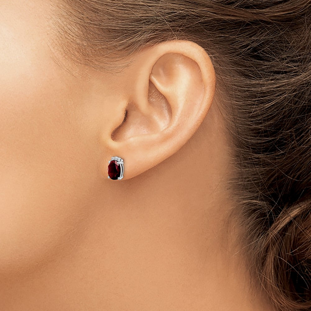 Sterling Silver Rhodium Plated Oval Garnet and Diamond Post Earrings