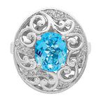 Sterling Silver Rhodium Blue Topaz and Diam. Ring