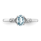 Sterling Silver Rhodium Plated Diamond and Aquamarine Oval Ring