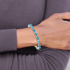 Sterling Silver Rhodium-plated Blue Topaz 6.5in Bracelet