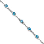 Sterling Silver Rhodium-plated Lt. Swiss Blue Topaz & Diamond Bracelet