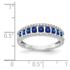 14k White Gold Graduated Channel-set Blue Sapphire and 1/4 carat Diamond Fancy Ring