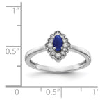 14k White Gold 1/10 carat Diamond and 5x3mm Oval Cabochon Blue Sapphire Halo Ring