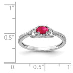 14k White Gold 1/6 carat Diamond and 5x3mm Oval Cabochon Ruby East-West Halo Ring