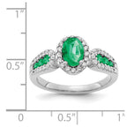14k White Gold 7x5mm Oval Emerald and 1/3 carat Diamond Halo Ring