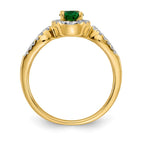14k 7x5mm Oval Emerald and 1/3 carat Diamond Halo Ring
