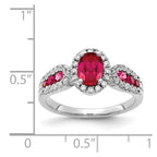 14k White Gold 7x5mm Oval Ruby and 1/3 carat Diamond Halo Ring