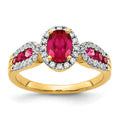 14k 7x5mm Oval Ruby and 1/3 carat Diamond Halo Ring