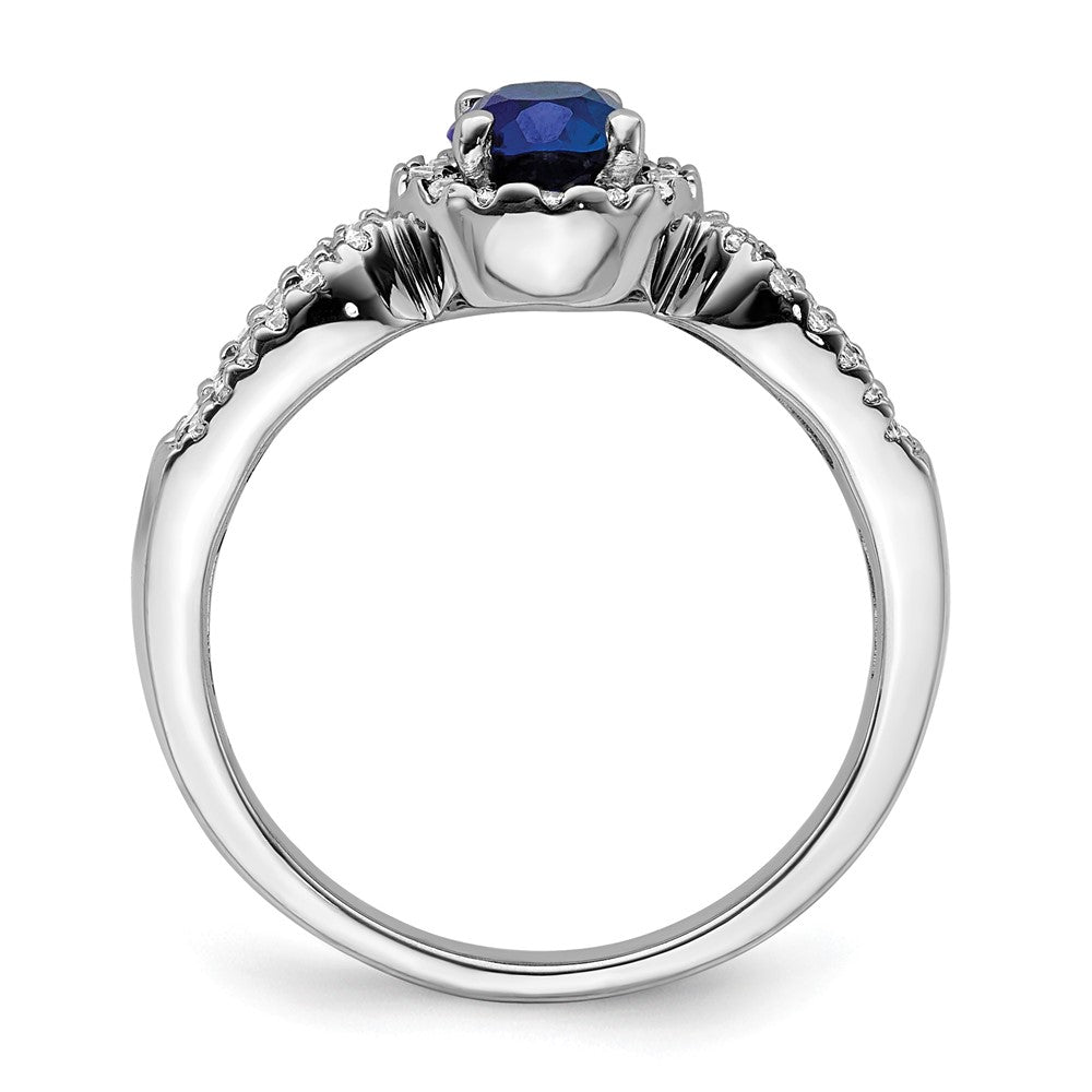 14k White Gold 7x5mm Oval Blue Sapphire and 1/3 carat Diamond Halo Ring