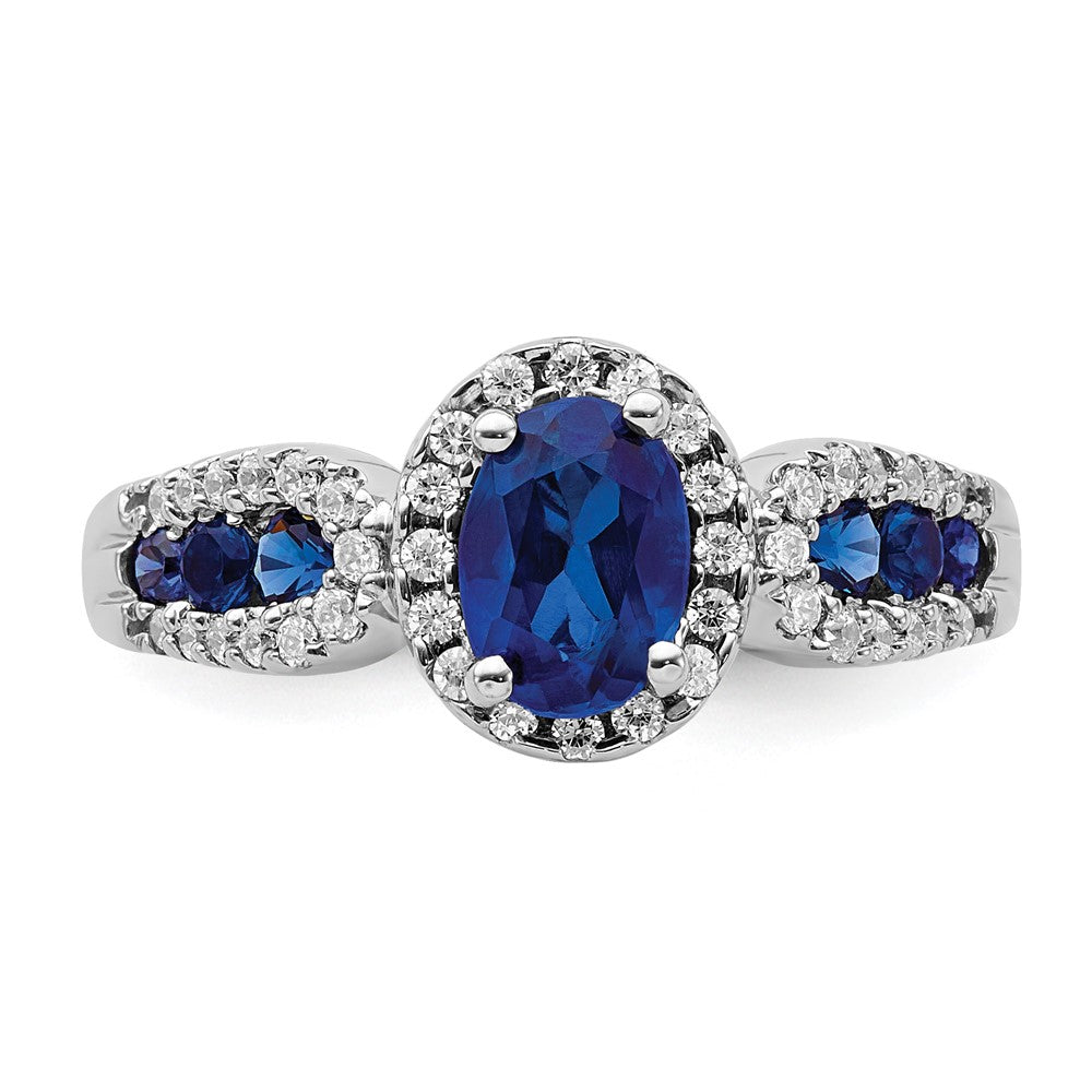 14k White Gold 7x5mm Oval Blue Sapphire and 1/3 carat Diamond Halo Ring