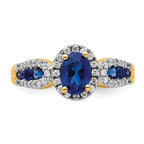 14k 7x5mm Oval Blue Sapphire and 1/3 carat Diamond Halo Ring