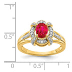 14k 1/5 carat Diamond and 7x5mm Oval Ruby Ring