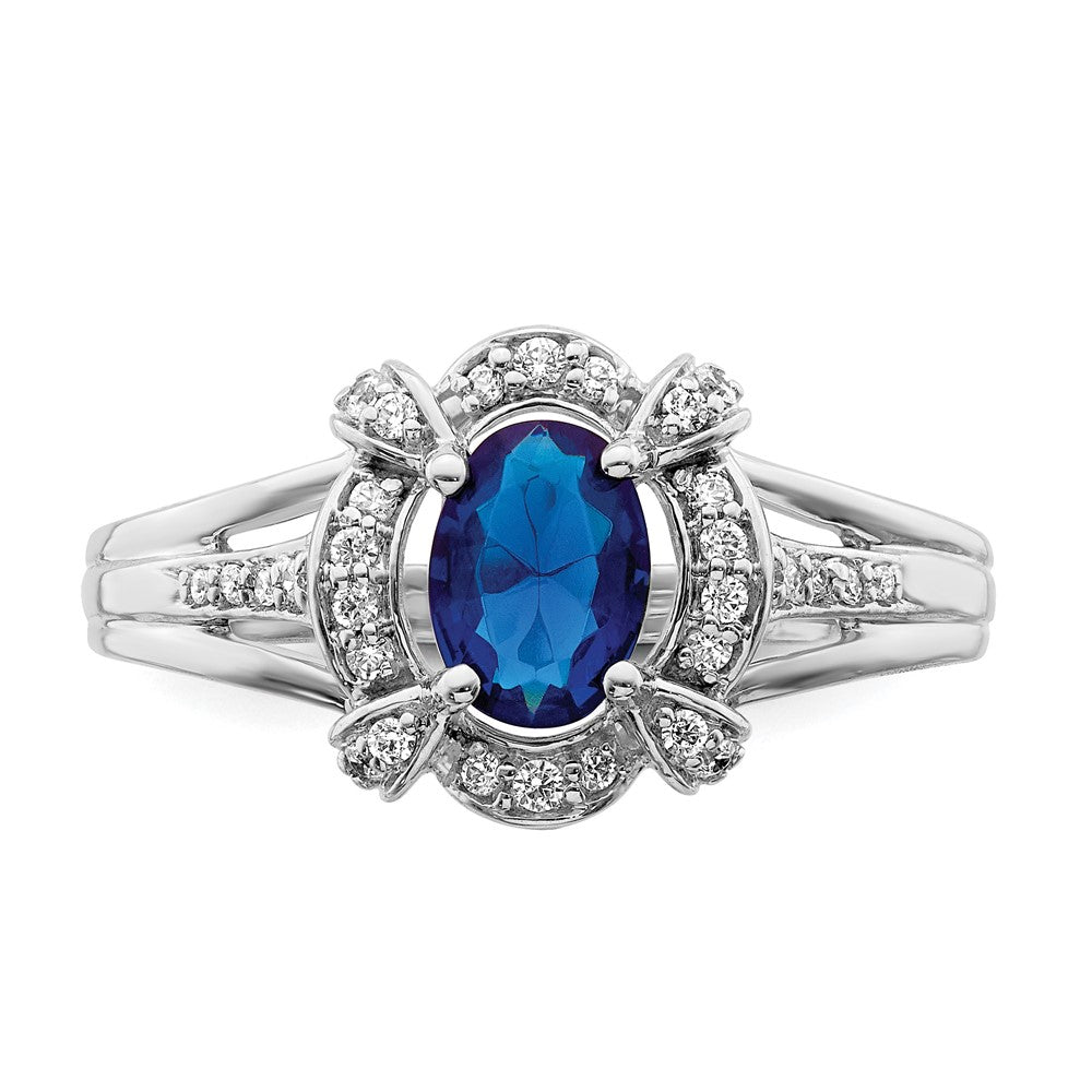 14k White Gold 1/5 carat Diamond and 7x5mm Oval Blue Sapphire Halo Ring