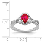14k White Gold 7x5mm Oval Ruby and 1/5 carat Diamond Halo Ring