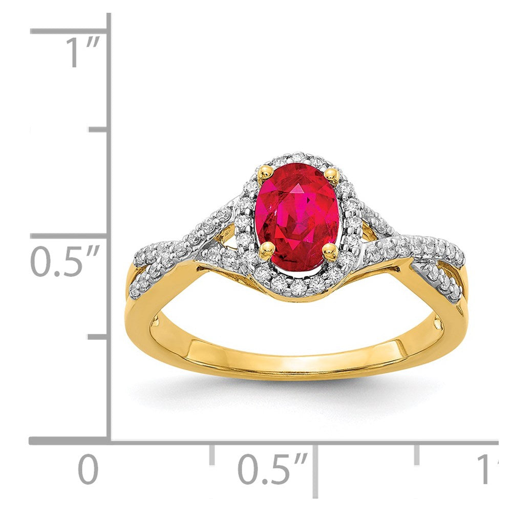 14k 7x5mm Oval Ruby and 1/5 carat Diamond Halo Ring