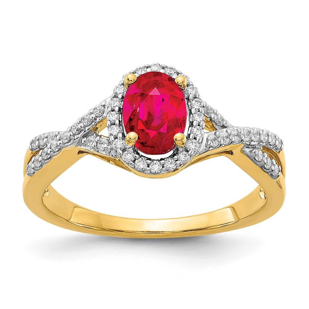14k 7x5mm Oval Ruby and 1/5 carat Diamond Halo Ring