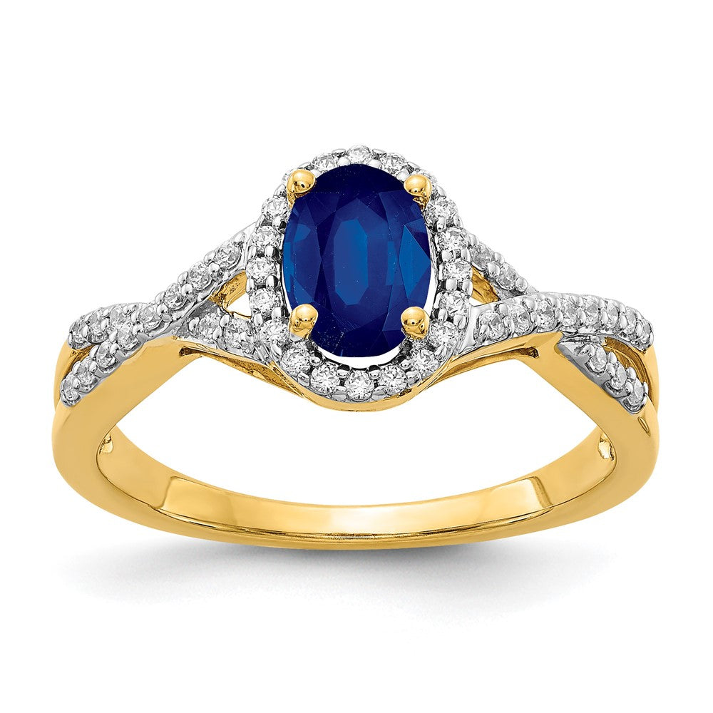 14k 7x5mm Oval Blue Sapphire and 1/5 carat Diamond Halo Ring