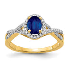 14k 7x5mm Oval Blue Sapphire and 1/5 carat Diamond Halo Ring