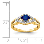 14k East-West 6x4mm Oval Blue Sapphire and 1/8 carat Diamond Ring