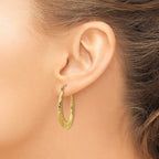 14k Polished Twisted Oval Hollow Hoop Earrings