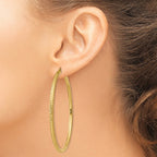 14k 3x65mm Diamond-cut Round Tube Hoop Earrings