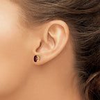 14k 7x5mm Oval Checker-cut Garnet Post Earrings