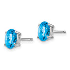 14k White Gold 7x5mm Oval Checker-cut Blue Topaz Post Earrings