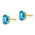 14k 8x6mm Oval Checker-cut Blue Topaz Post Earrings