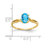 14k 7x5mm Oval Blue Topaz Twist Ring