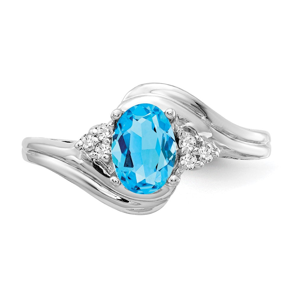 14k White Gold 7x5mm Oval Blue Topaz and 1/15 carat AAA Diamond Ring