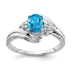 14k White Gold 7x5mm Oval Blue Topaz and 1/15 carat A Diamond Ring